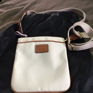 White crossbody Coach bag w/ brown leather accents